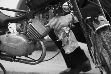 black and white motorcycle engine repair photo