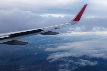Fototapeta na wymiar Wing of airplane in the sky