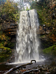 Henrhyd Falls with a drop of 90ft it is the highest waterfall in southern Wales. It is possible to walk behind the curtain of water which doubled as the entrance to the Batcave in Dark Knight Rises.
