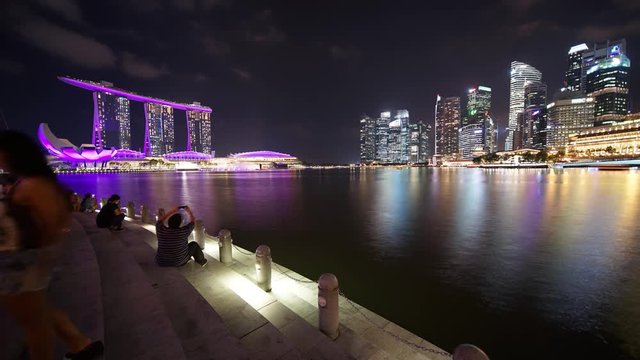 Singapore - November 27, 2017: Beautiful landscape of Marina Bay Sands Hotel from Esplanade Theatre at night. Shot in 4k resolution