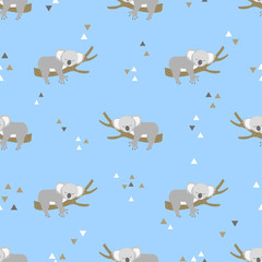Seamless vector pattern with cute little sleeping koala bears. © Afanasia