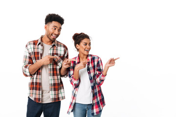 Fototapeta premium Portrait of a satisfied young african couple standing together
