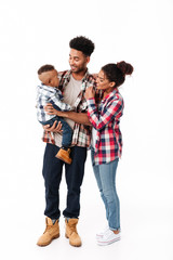 Fototapeta premium Full length portrait of a happy young african family