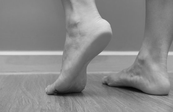 Closeup of a female foot heel pain, plantar fasciitis