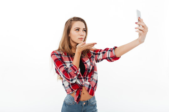 Portrait of a pretty lovely girl in plaid shirt