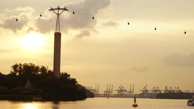 Singapore - November 27, 2017: Timelapse footage of beautiful landscape of HarbourFront with Singapore Cable Car at dusk time. Shot in 4k resolution