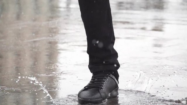 Slow motion Video of splashing water afer jump in the pool