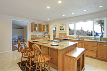 Remodeled natural light Kitchen With wooden Kitchen Cabinets