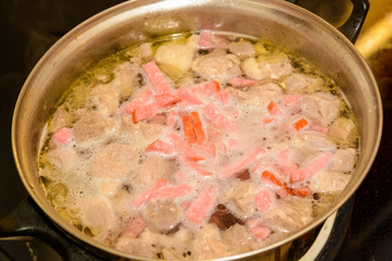 Sausage soup in pan