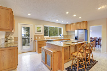 Remodeled natural light Kitchen With wooden Kitchen Cabinets