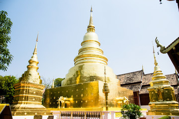 Fototapeta premium three magestic golden stupa in thai temple. chiang mai. thailand