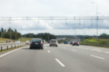 Driving a car on the highway in good weather conditions