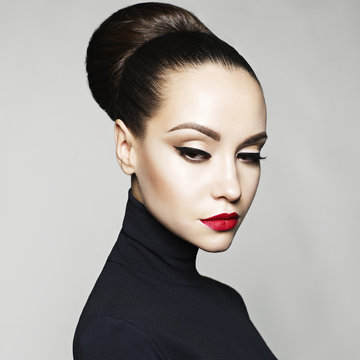 Beautiful elegant woman in black turtleneck