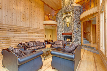 Spacious great room features pine paneled walls