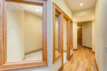 Bright Empty hallway with hardwood floor.