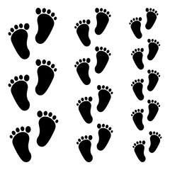 Black footprint icon. Silhouettes of different size. Vector illustration