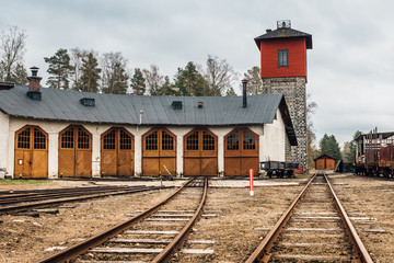 Fototapeta na wymiar Old railroad service station and garage