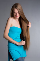 Fototapeta premium young woman with long beautiful hair