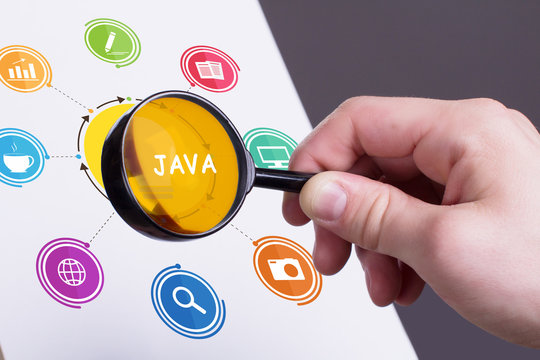 The concept of business, technology, the Internet and the network. Young businessman showing inscription: Java