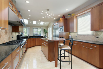 Kitchen with island and breakfast bar