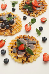 Waffles with fruits, breakfast background