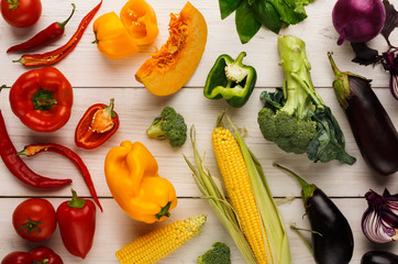 Rainbow background with lots of colorful vegetables