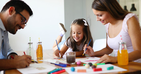 Obraz na płótnie Canvas Happy familiy spending fun time at home