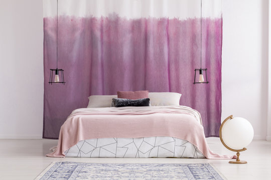 Pink bedroom with white globe