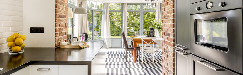 Open kitchen with dining room