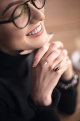 success business woman in glasses in cafe