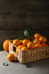Fototapeta na wymiar oranges and tangerines in a box