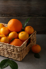 oranges and tangerines in small box