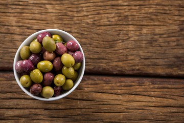 Marinated olives in white bowl