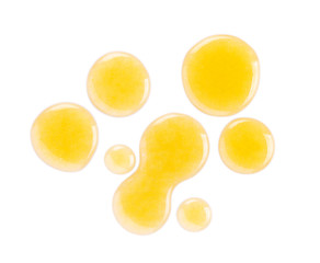 Sweet honey drop isolated on white background