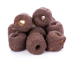 Crunchy corn chocolate snacks on a white background