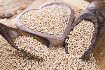 Grains of quinua on wood - Chenopodium quinoa