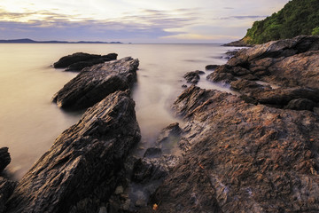 Sea long exposure with rock in the morning