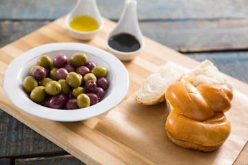 Marinated olives with bread and olive oil