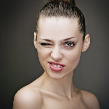 Funny face, joke, studio female portrait