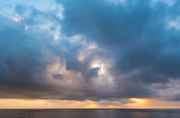 Fototapeta na wymiar Dramatic cloudy Sky over Sea, morning sky and water, sunrise above ocean