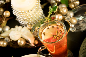 christmas festive table food drink decorated for sharing candle punch hot