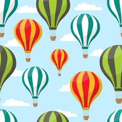 Fototapeta premium Cartoon hot air balloons in blue sky vector seamless pattern for air travel concept. Illustration of striped air balloon pattern for your web design.