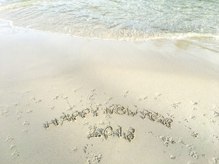 Happy New Year 2018, lettering on the beach, Year of the Dog2018