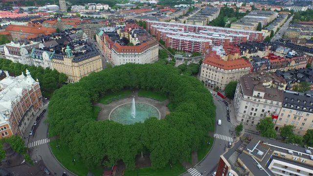 Aerial of the beautiful Karlaplan Park, Square and Fountain, located in the city of Stockholm, Sweden.