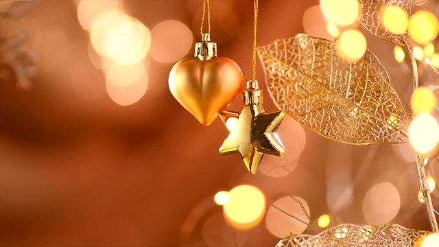 Christmas and New Year golden decoration. Abstract blinking holiday background. Slow motion 4K UHD video footage. 3840X2160