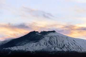 Fototapeta na wymiar landscape of mountain Etna volcano with colorful sky at sunset in Sicily 
