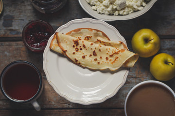 sweet pancakes with jam, cottage cheese and other - beautiful serving