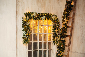 christmas room interior design xmas tree decorated by lights resents gifts toys candles copy space...