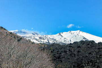 Snow on mount etna with blue sky