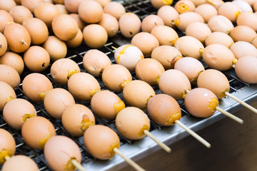 Grilled eggs at street food in Thailand